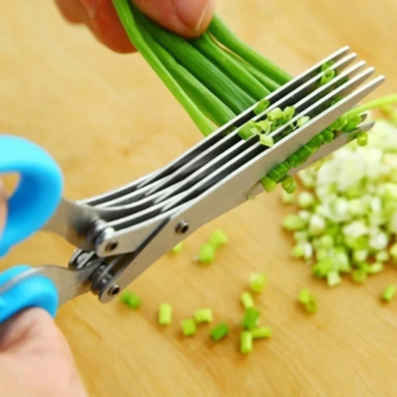 Stainless steel kitchen scissors for cutting, shredding, and chopping ingredients.